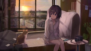 夕阳窗边听音乐少女和猫