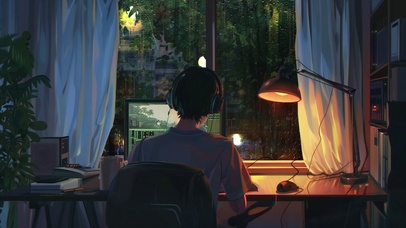 雨夜男孩在电脑前带耳机壁纸