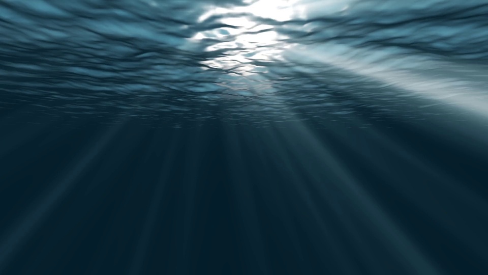 水下仰视视角，海面波纹间数道白光穿透深蓝色水域