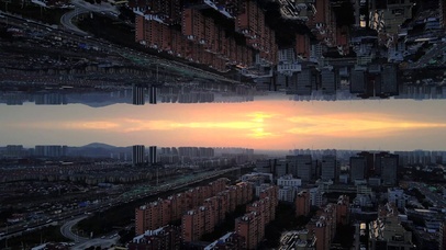 4K傍晚城市夕阳倒影