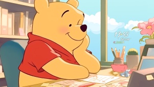 窗台发呆维尼熊
