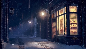 夜晚下雪街边的面包店