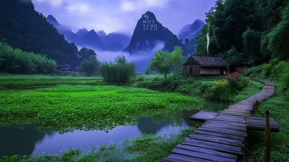 护眼乡下水塘栈道木屋