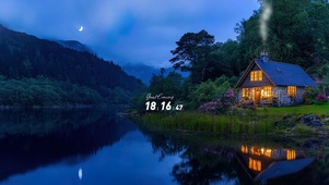 夜晚湖景小屋微光