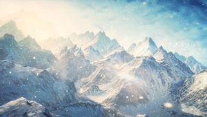 唯美阳光暴风雪山景