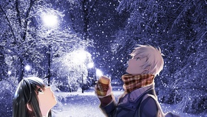 冬季飘雪公园的情侣