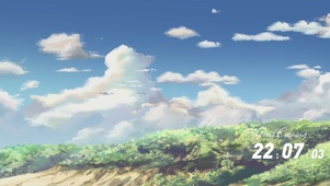 蓝天白云与翠绿灌木林