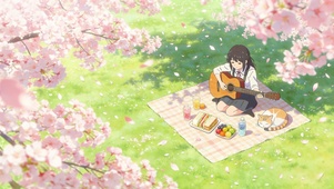 樱花树下野餐的女孩和猫