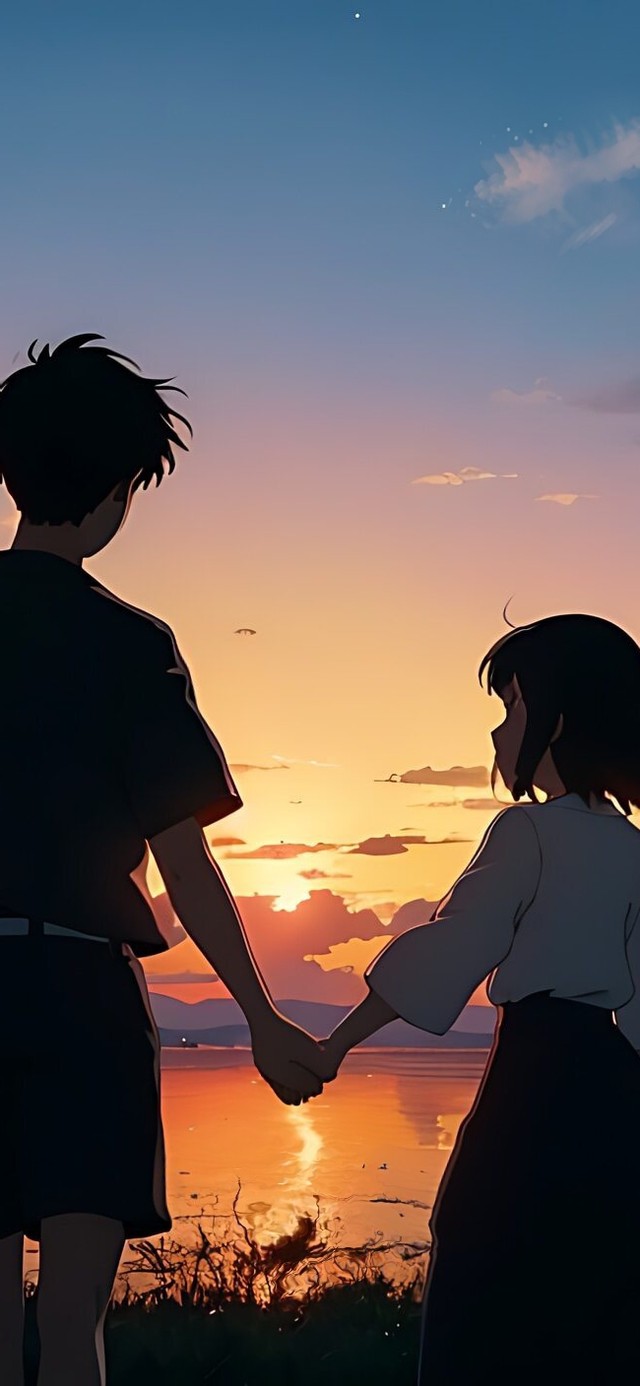 情侣牵手唯美背影夕阳