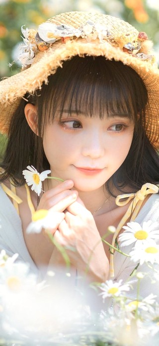 雏菊花田里的小天使