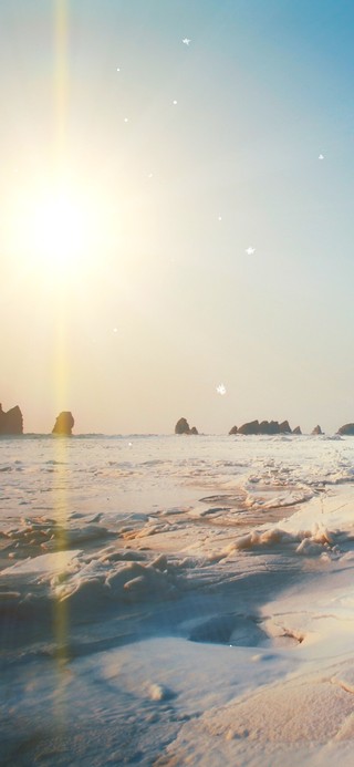 结冰的海滩落日