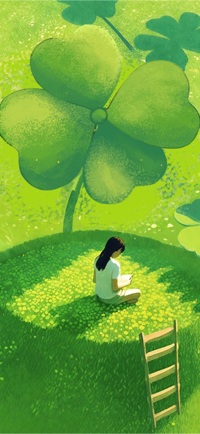 四叶草下看书的少女