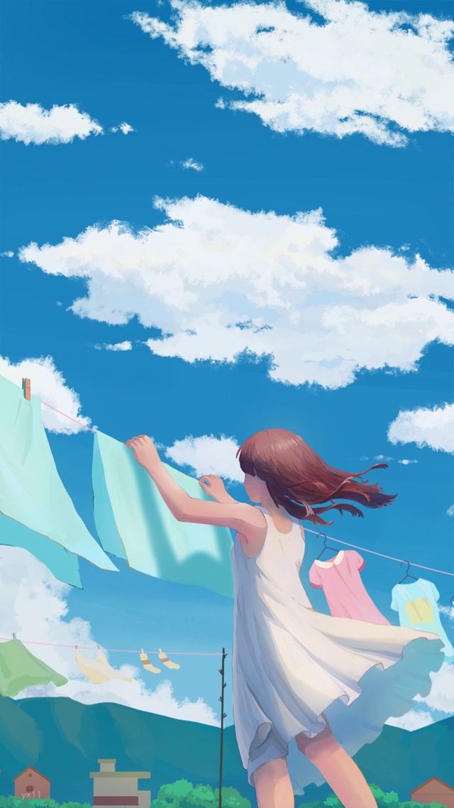 阳光里她在院子中央晾晒衣裳